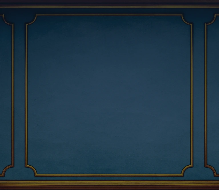 Elegant dark blue wall with gold decorative trim and molding, creating a classic and sophisticated backdrop.